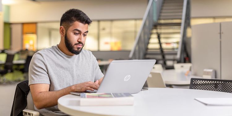 Image representing a student studying for assessments at the University of Leeds.
