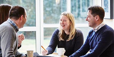 University of Leeds mature students working around a table together