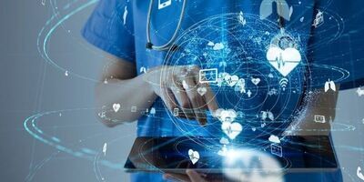 An image of a healthcare professional using a tablet device.