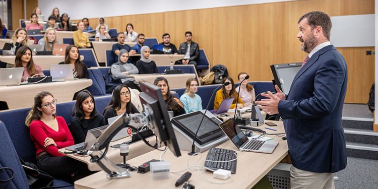Lecturer teaching a class at the School of Healthcare