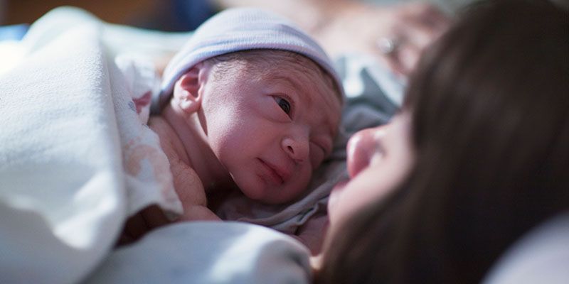 Mother with newborn baby